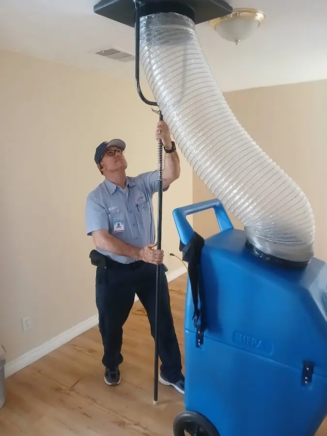 HVAC Installation technician using HEPA equipment in Bullard
